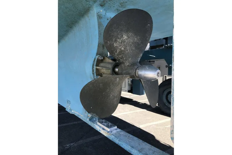 Slide: The Image of Propeller of 1979 Ocean Alexander 40 Double Cabin, displayed in a boatyard setting. - 70
