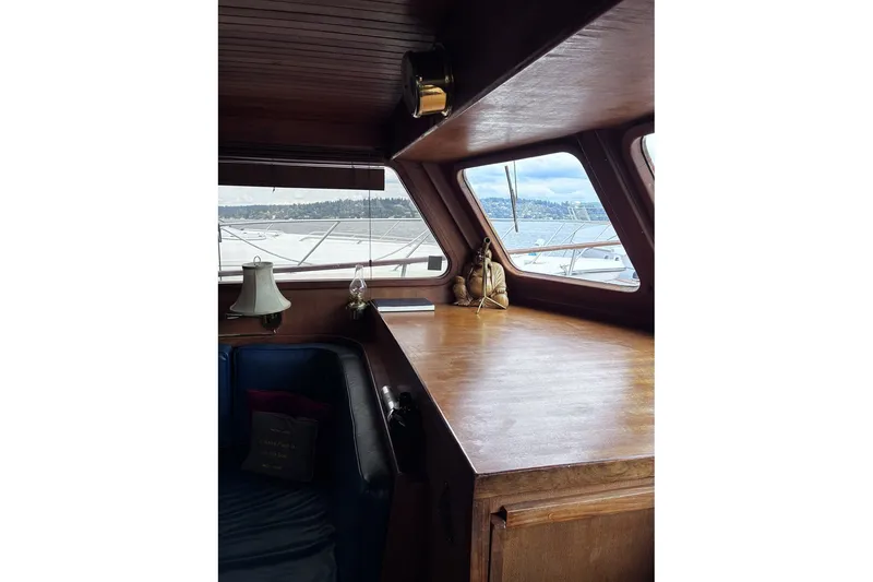 Slide: The Image of Interior of 1979 Ocean Alexander 40 Double Cabin with wooden finish and scenic window view. - 15