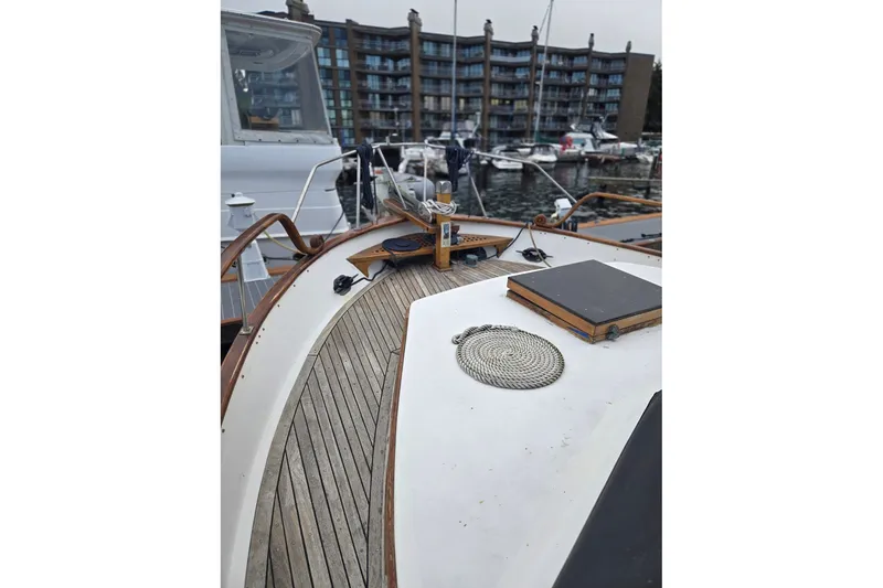 Slide: The Image of 1979 Ocean Alexander 40 Double Cabin yacht deck with marina view. - 7
