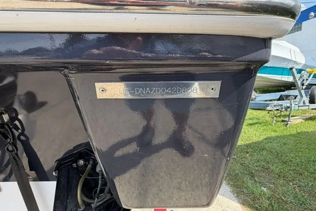 Slide: The Image of 2008 Donzi 27 ZR boat hull with visible identification number plate. - 4