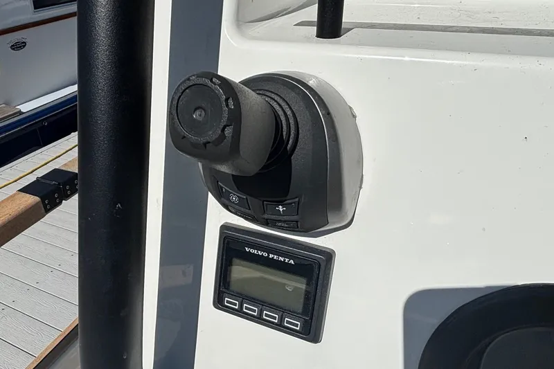 Slide: The Image of 2024 Targa 32 boat control panel with joystick and display. - 66
