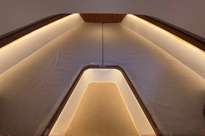 Slide: The Image of Luxurious interior cabin of 2024 Targa 32 boat with ambient lighting. - 45