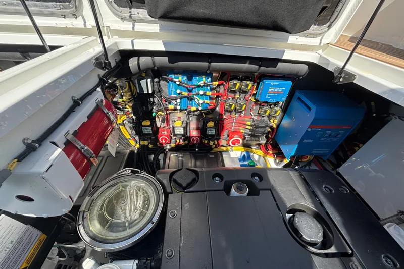 Slide: The Image of Engine compartment of 2024 Targa 32 boat, showcasing electrical systems and components. - 62