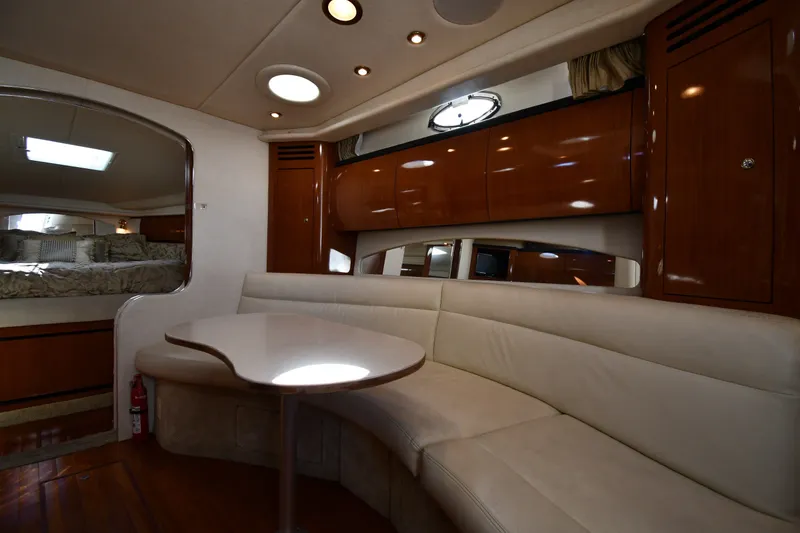 Slide: The Image of Luxurious interior of 2002 Sea Ray 360 Sundancer yacht with elegant seating and cabinetry. - 25
