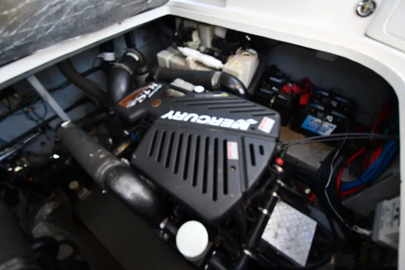 Slide: The Image of Engine compartment of a 2002 Sea Ray 360 Sundancer with Mercury components. - 41