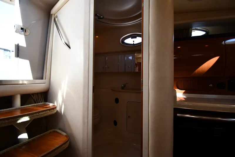 Slide: The Image of Interior view of 2002 Sea Ray 360 Sundancer yacht bathroom and stairs. - 32