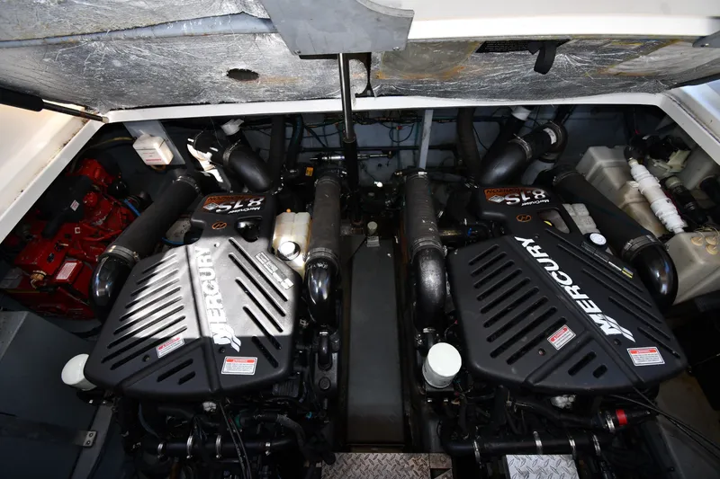 Slide: The Image of Engine room of a 2002 Sea Ray 360 Sundancer with twin Mercury engines. - 40