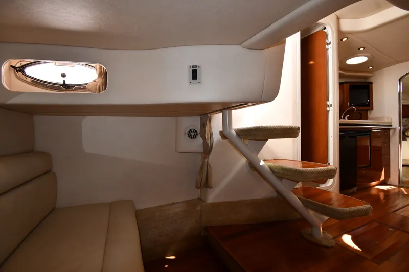 Slide: The Image of Interior of 2002 Sea Ray 360 Sundancer yacht with stairs and kitchenette. - 36