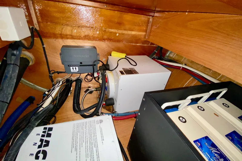 Slide: The Image of Electrical components and wiring inside a 2005 Lagoon 380 S2 yacht. - 118