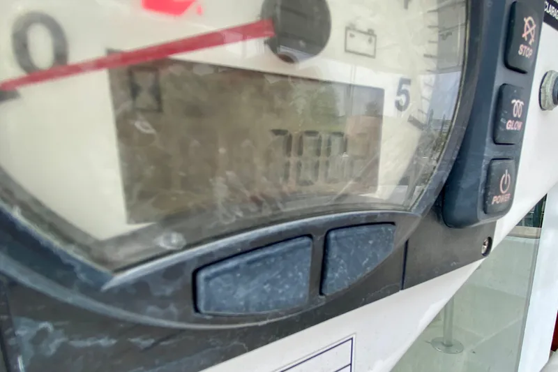 Slide: The Image of Close-up of a 2005 Lagoon 380 S2 boat control panel with digital display. - 145