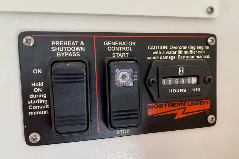 Slide: The Image of Control panel of a Northern Lights generator on a 2005 Lagoon 380 S2 yacht. - 121