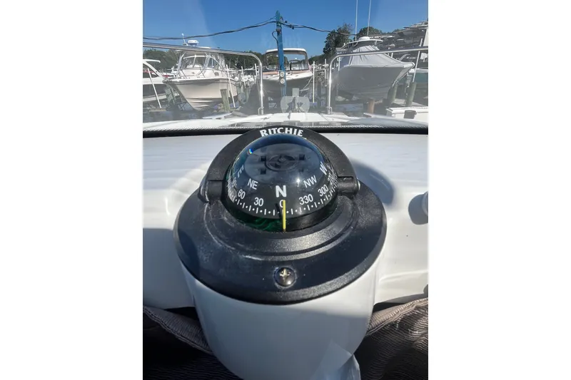 Slide: The Image of Compass on Jeanneau NC 795 boat, 2020 model, docked at marina. - 29