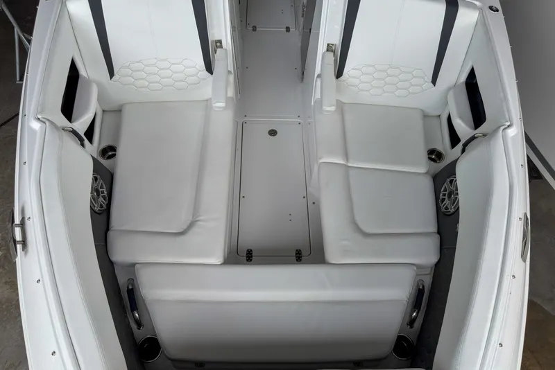 Slide: The Image of 2026 Four Winns H9 OB boat interior with white seating and modern design. - 20