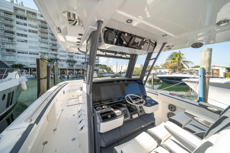 Slide: The Image of Interior view of 2022 World Cat 400 CC-X boat docked at marina. - 21
