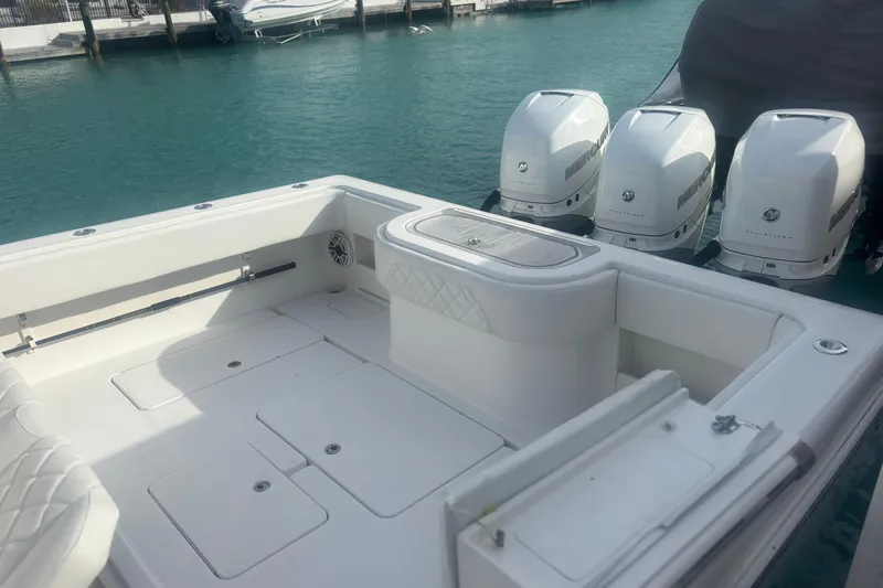 Slide: The Image of 2017 Invincible 39 Open Fisherman boat with four powerful Mercury outboard engines. - 9