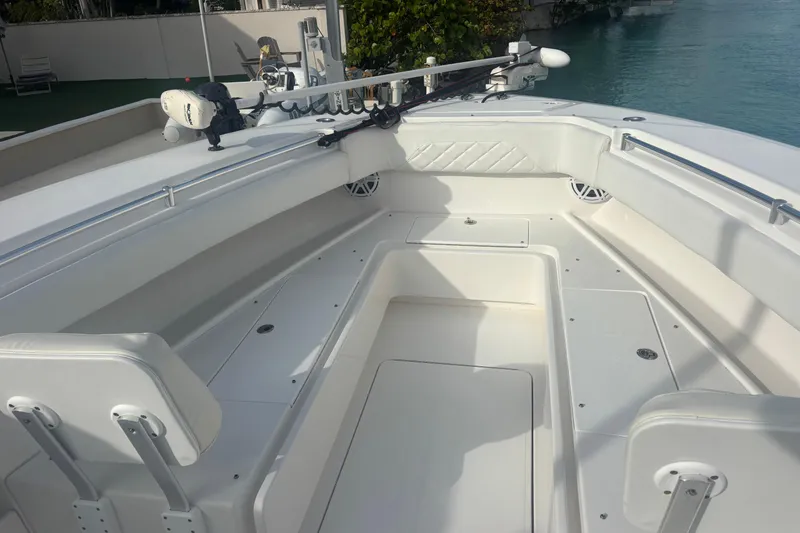 Slide: The Image of 2017 Invincible 39 Open Fisherman boat interior with spacious seating and fishing equipment. - 4