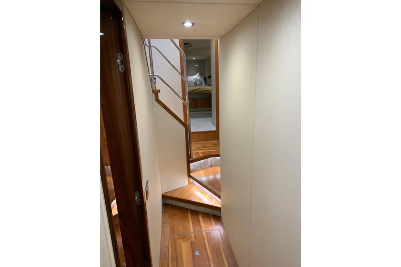 Slide: The Image of Interior hallway of 2016 Sunseeker Manhattan 65 yacht with wooden flooring. - 14
