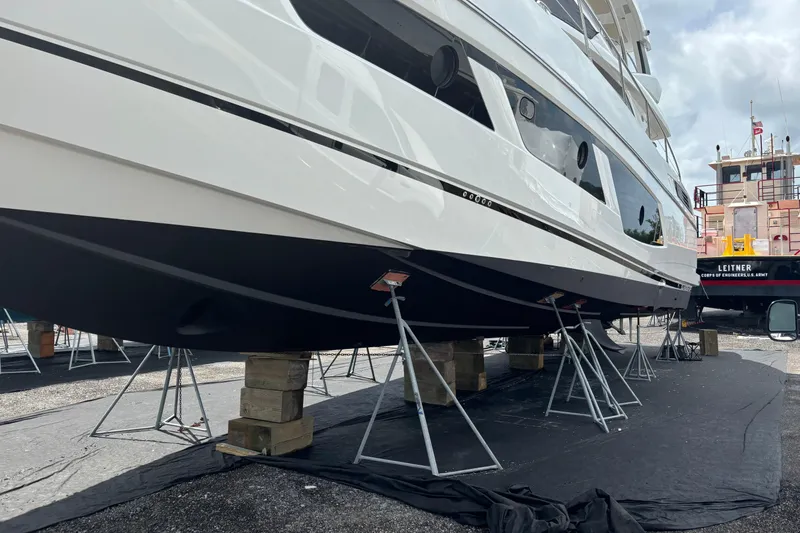 Slide: The Image of 2016 Sunseeker Manhattan 65 yacht on dry dock, supported by stands. - 30