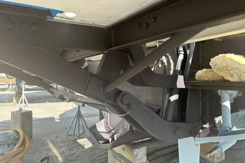 Slide: The Image of Underneath view of a 2016 Sunseeker Manhattan 65 yacht during maintenance. - 33