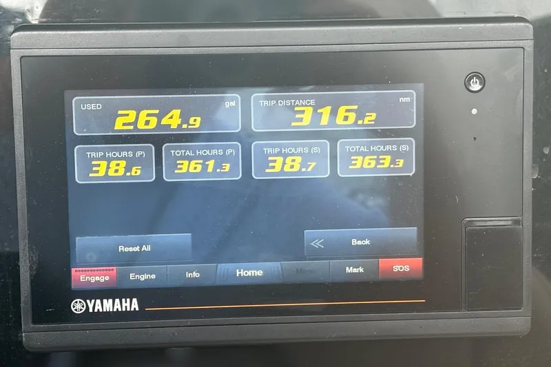Slide: The Image of Yamaha display showing fuel usage and trip data for 2013 Scout 275 LXF boat. - 19