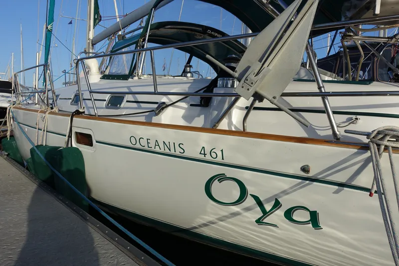 Slide: The Image of 2001 Beneteau Oceanis 461 sailboat docked at marina, side view. - 56
