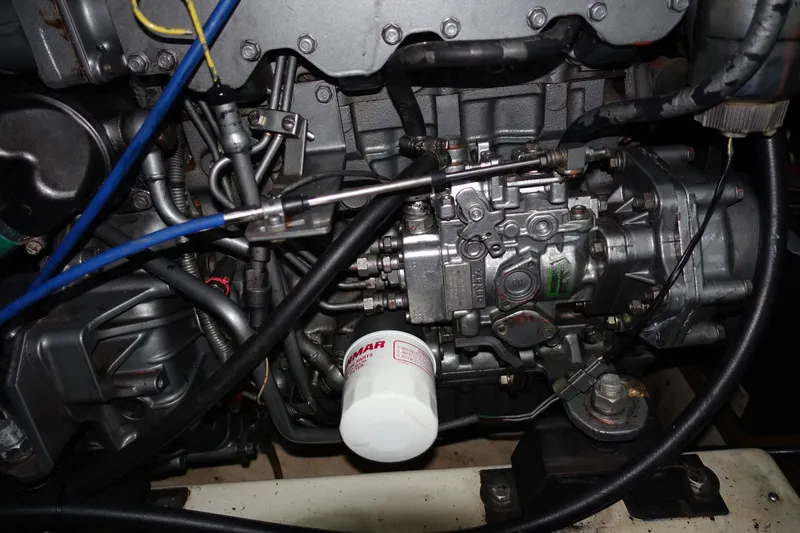 Slide: The Image of Engine of a 2001 Beneteau Oceanis 461 sailboat, showcasing mechanical components. - 42