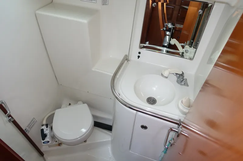 Slide: The Image of Bathroom interior of 2001 Beneteau Oceanis 461 yacht with sink and toilet. - 37
