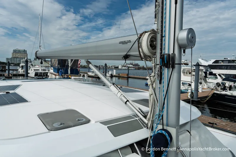Slide: The Image of 2019 Nautitech 40 Open catamaran docked at marina with clear sky. - 18