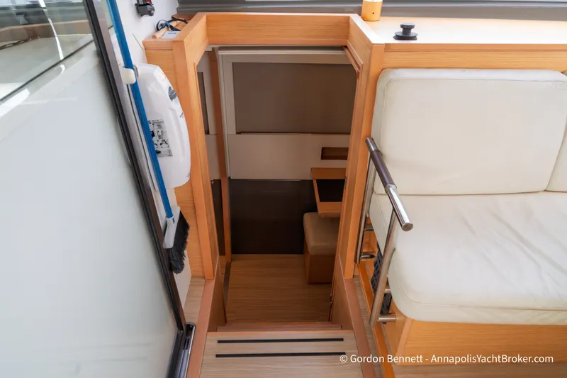 Slide: The Image of Interior view of 2019 Nautitech 40 Open yacht, featuring wooden stairs and seating area. - 43