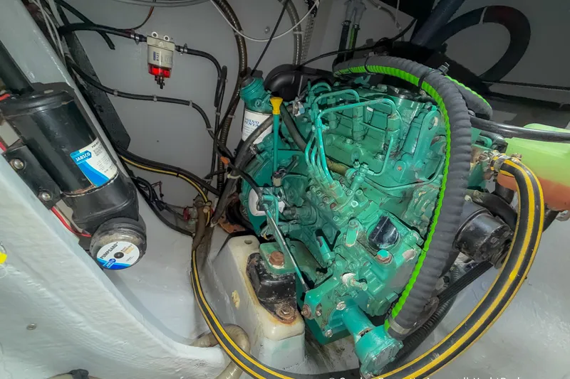 Slide: The Image of Engine compartment of a 2019 Nautitech 40 Open catamaran, featuring a Volvo Penta engine. - 84