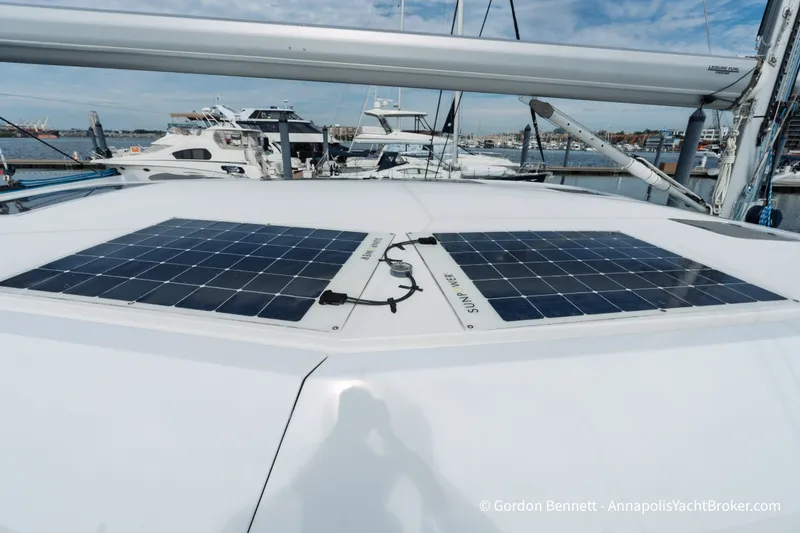 Slide: The Image of Solar panels on 2019 Nautitech 40 Open catamaran docked at marina. - 23