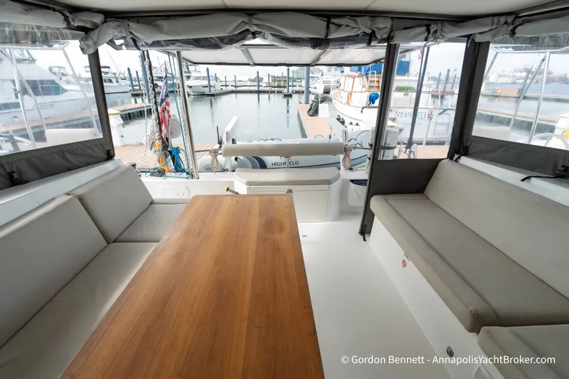 Slide: The Image of Spacious cockpit of 2019 Nautitech 40 Open catamaran with comfortable seating and wooden table. - 35