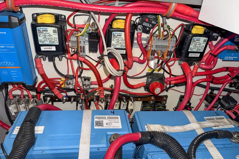 Slide: The Image of Electrical system of a 2019 Nautitech 40 Open catamaran, featuring wiring and battery components. - 80