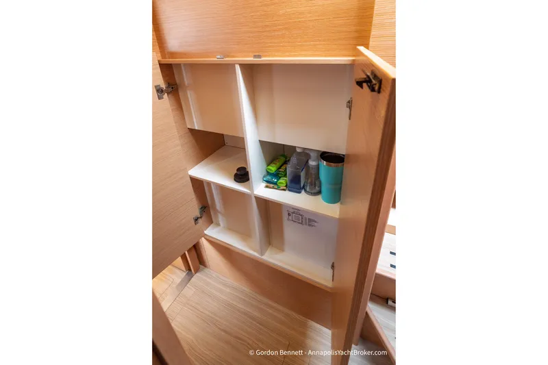 Slide: The Image of Cabinet interior on 2019 Nautitech 40 Open yacht with toiletries and storage shelves. - 49