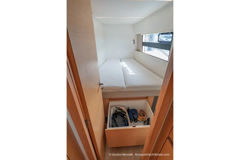 Slide: The Image of Cabin interior of 2019 Nautitech 40 Open yacht with storage drawer open. - 55