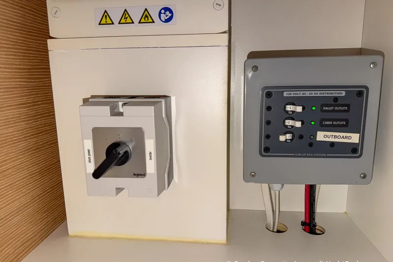 Slide: The Image of Electrical panel and switchboard on a 2019 Nautitech 40 Open catamaran. - 74