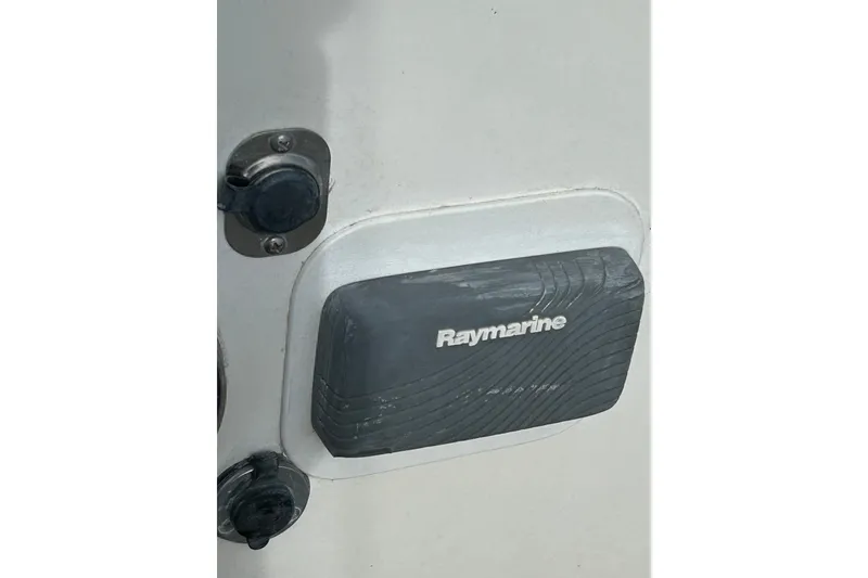 Slide: The Image of Raymarine equipment on 1976 Sabre 28 sailboat, featuring marine electronics. - 14