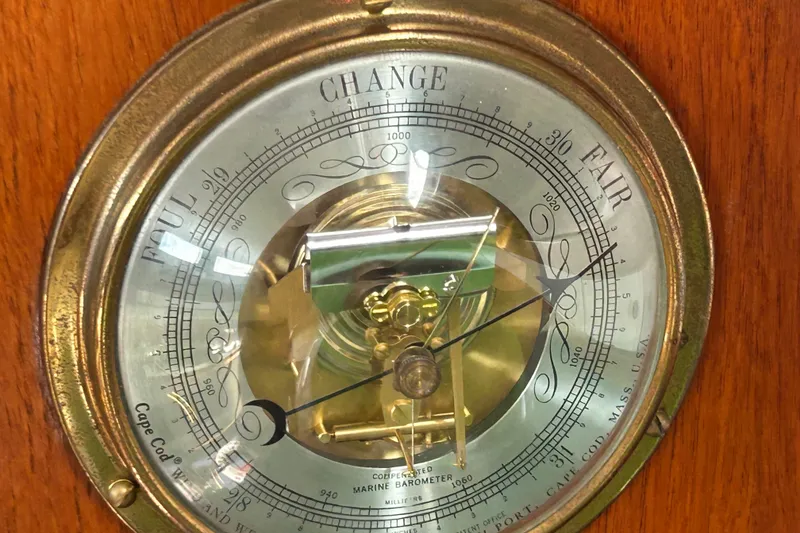 Slide: The Image of Vintage marine barometer on a 1976 Sabre 28 sailboat, displaying weather conditions. - 47