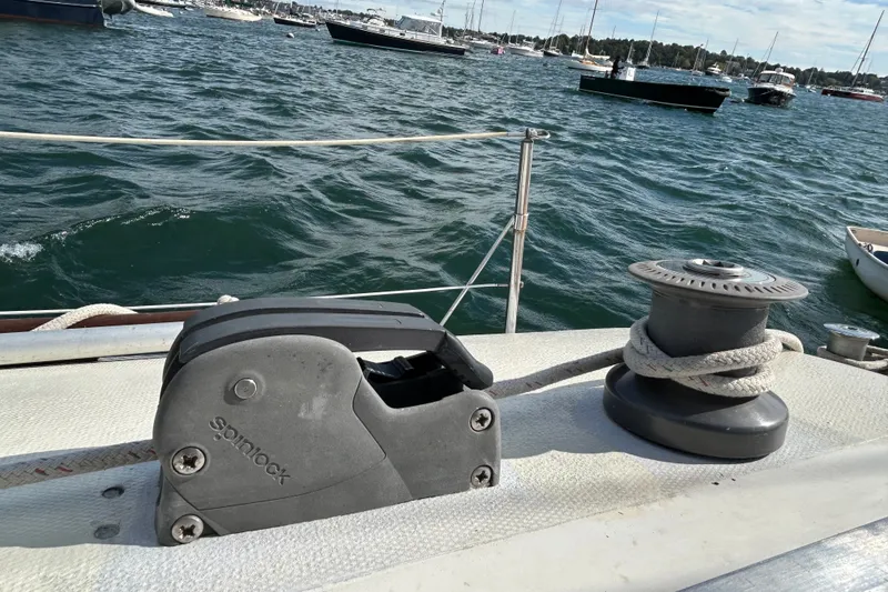 Slide: The Image of Sailboat deck with winch and rope, Sabre 28, 1976 model, on a windy day. - 21