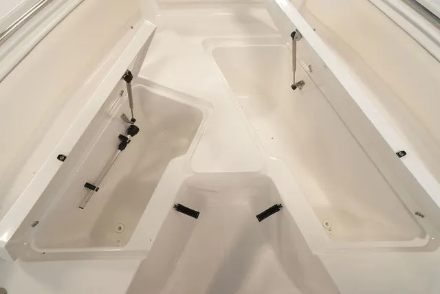 Slide: The Image of The image shows the bow storage area of a Sea Hunt Ultra 229 boat. - 31
