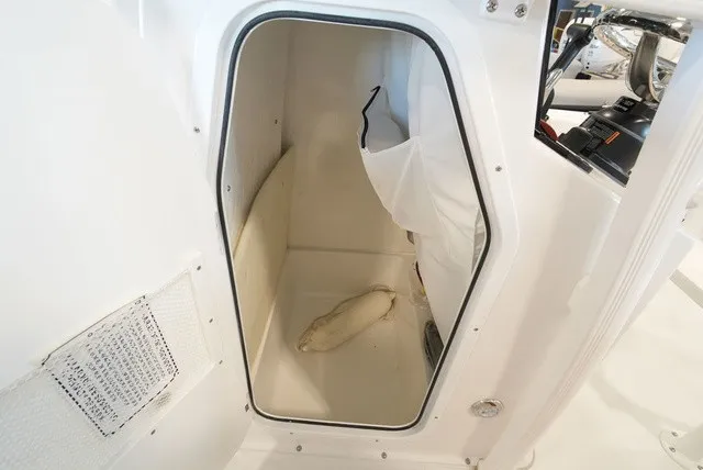 Slide: The Image of Interior view of a storage compartment on a Sea Hunt Ultra 229 boat. - 27