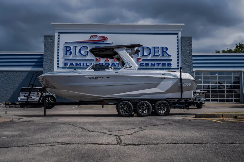 The Image of 2026 Tigé Ultré 25ZX boat on trailer at Big Thunder Marine center. - 1