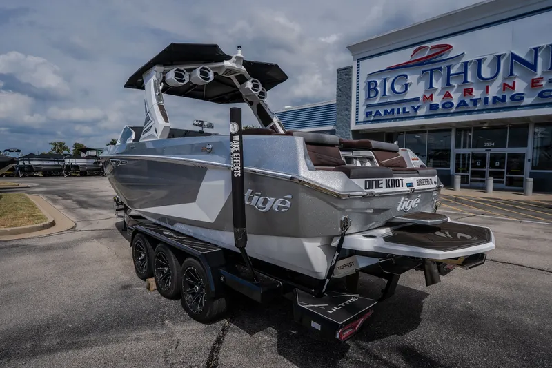 Slide: The Image of 2026 Tigé Ultré 25ZX boat at Big Thunder Marine dealership. - 14