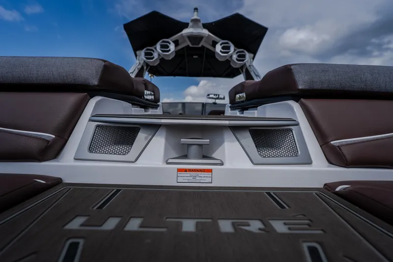 Slide: The Image of 2026 Tigé Ultré 25ZX boat interior with sleek seating and modern design. - 19