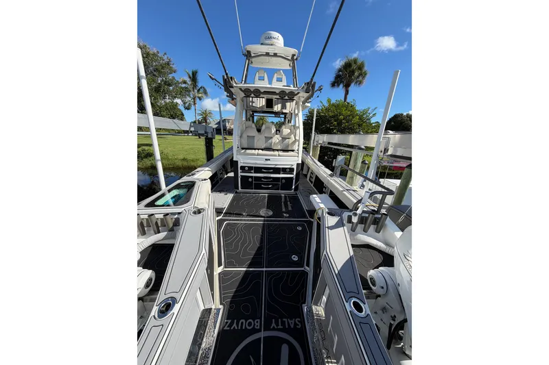 Slide: The Image of 2021 Solace 345CC boat interior with advanced navigation equipment and sleek design. - 33