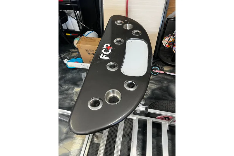 Slide: The Image of Black boat console with cup holders, labeled "FC+", for 2021 Solace 345CC model. - 50