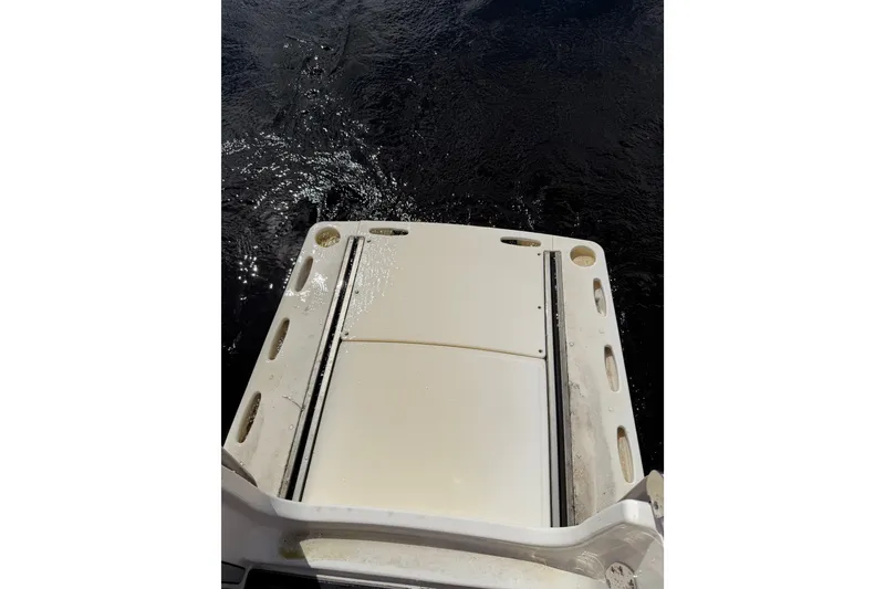 Slide: The Image of 2021 Solace 345CC boat deck with water reflections. - 38