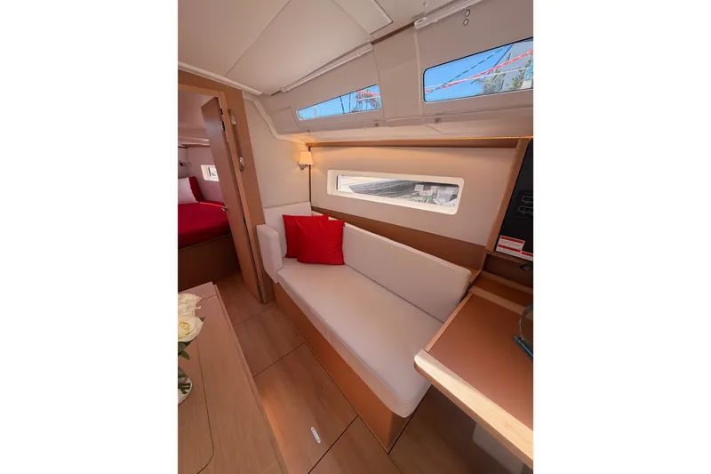 Slide: The Image of Interior of 2024 Jeanneau Sun Odyssey 380 yacht, featuring cozy seating and modern design. - 64