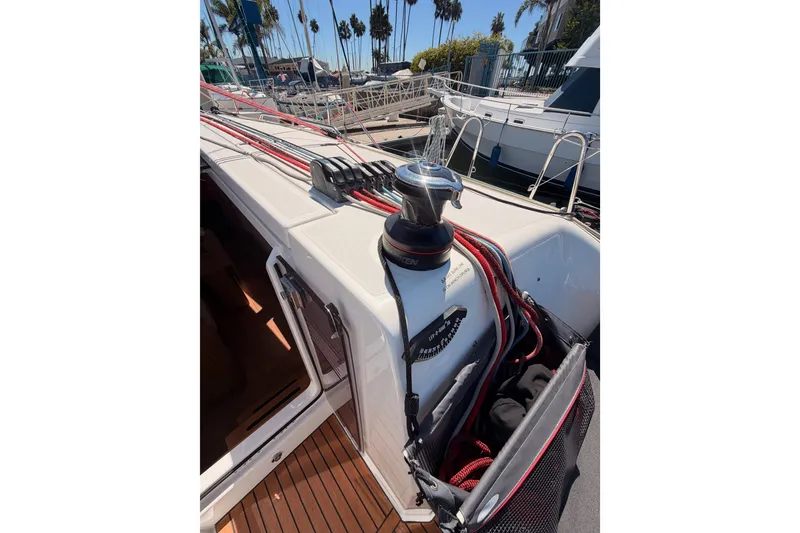 Slide: The Image of 2024 Jeanneau Sun Odyssey 380 deck with winch and rigging details. - 40