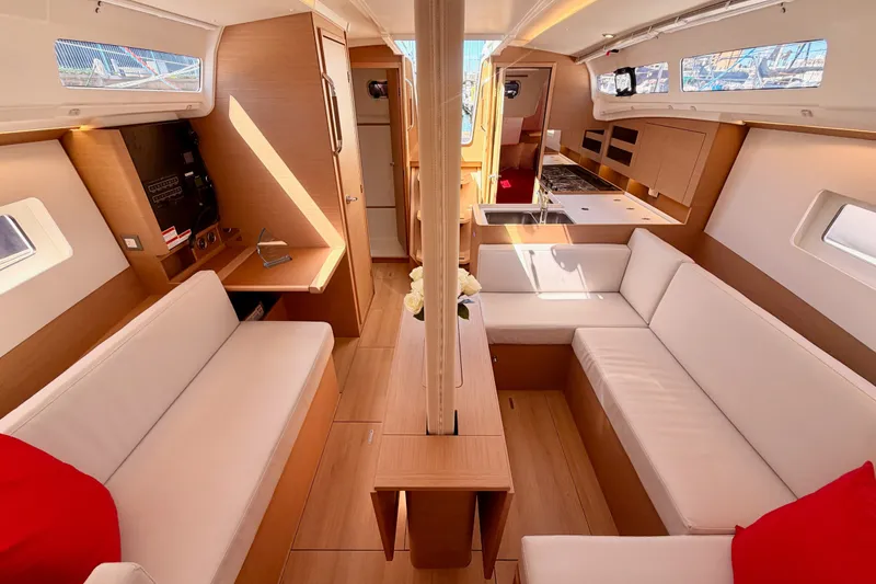 Slide: The Image of Luxurious interior of 2024 Jeanneau Sun Odyssey 380 yacht with modern furnishings. - 73